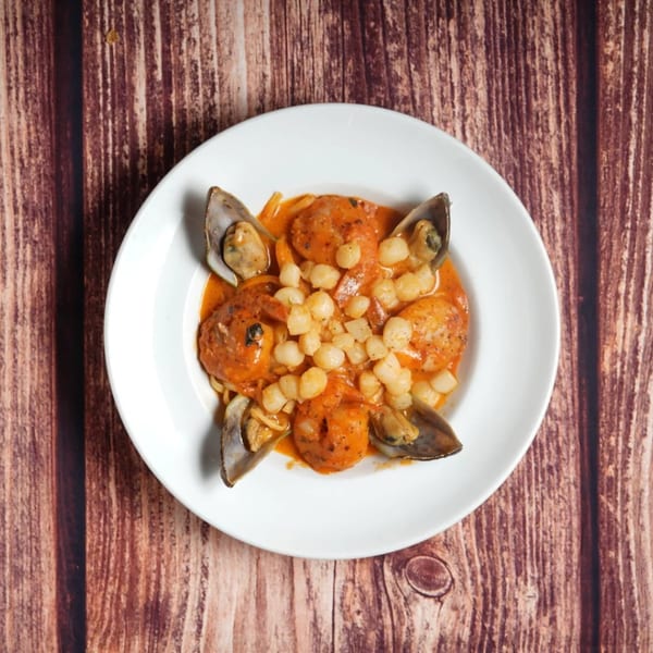 Billito's Italian Restaurant's seafood pasta with mussels, shrimp, and scallops in a red sauce.