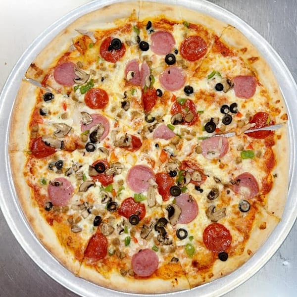 Billito's Italian Restaurant's whole pizza with pepperoni, salami, mushrooms, olives, and green peppers.